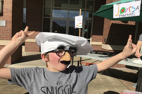 Child in costume at pancake party